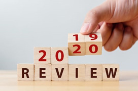 Image shows wooden blocks that read 2020 Review